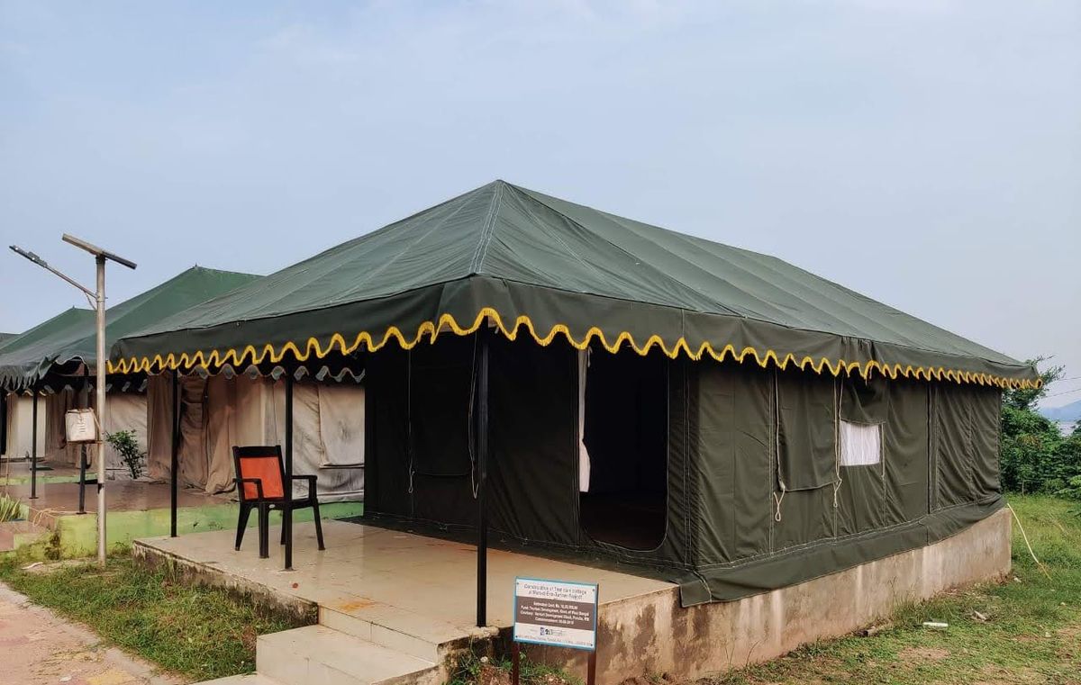 Swiss cottage resort tent with front verandah, made by Goyalka Brothers